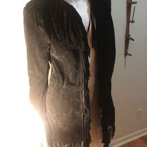 Black suede leather jacket with fridges.